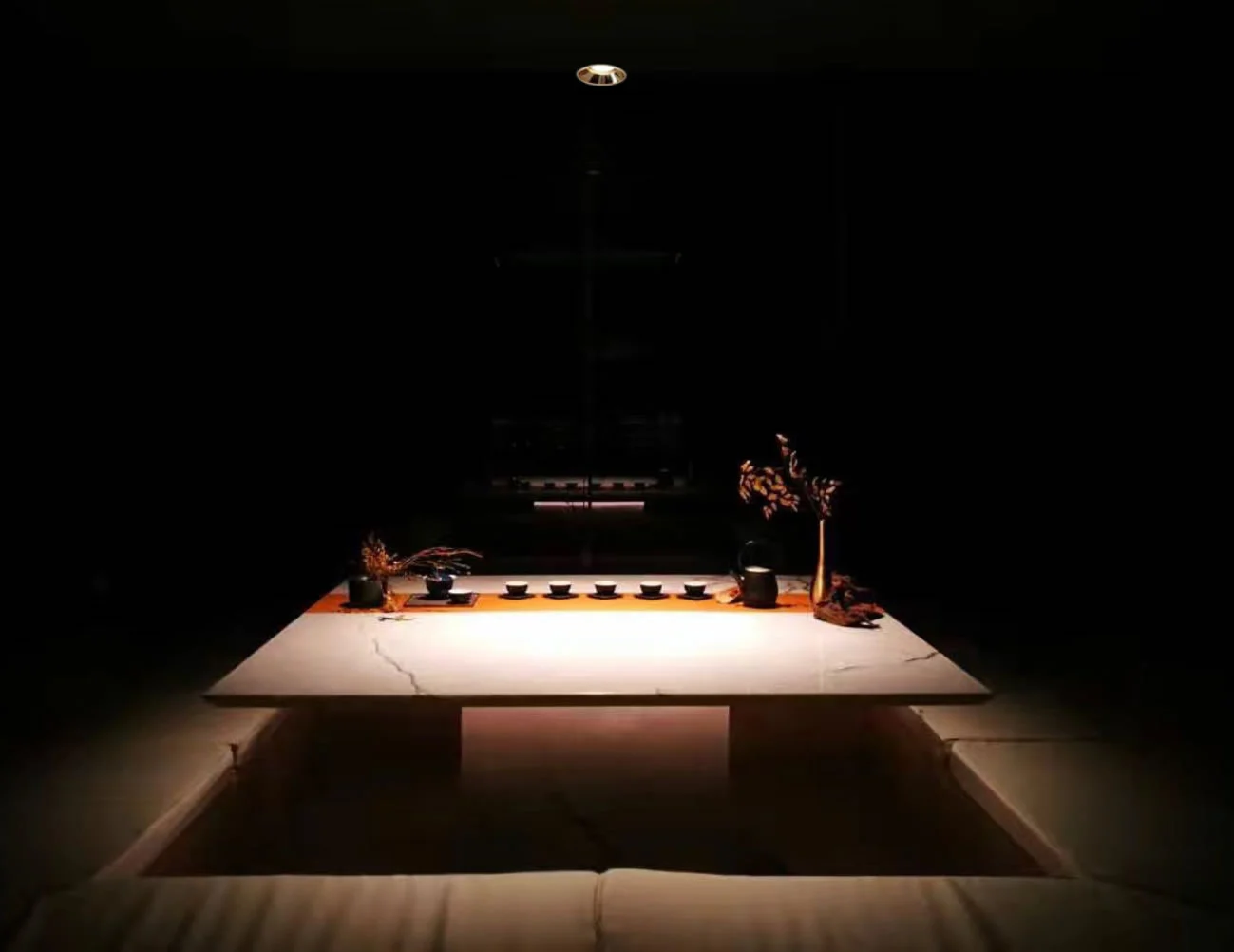 SENSE 20 downlight creating layered ambient illumination in a contemporary interior